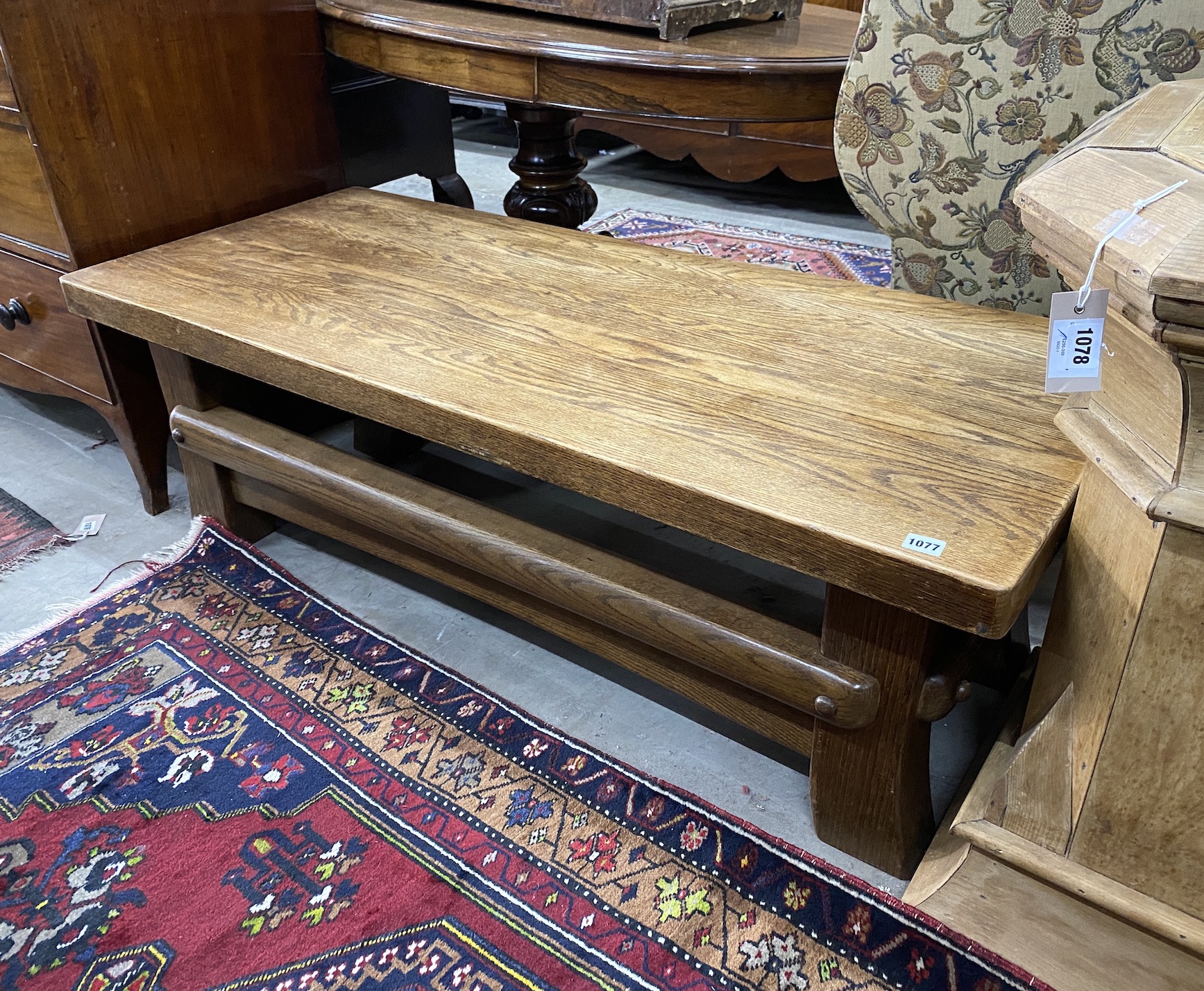 A rectangular rustic style oak coffee table width 137cm, depth 57cm, height 45cm.